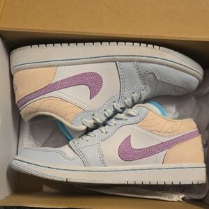 Nike Air Jordan Low SE in White and Fuchsia